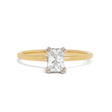 Radiant diamond solitaire engagement ring. Set in an unusual 8 claw platinum setting with round gold band. Designed by London based engagement ring designer Antonia Guise